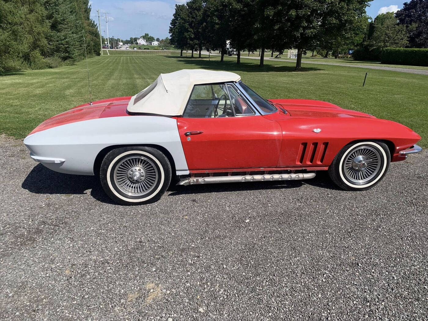 Red and white Corvette convertible